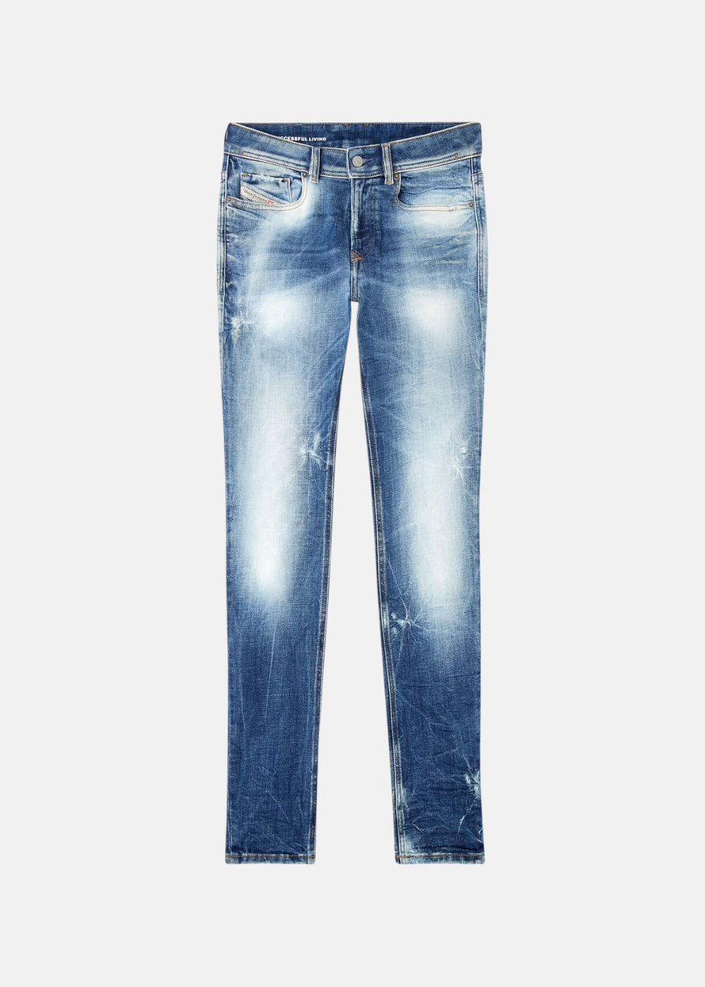 Jeans Diesel 1979 Sleenker skinny bleu foncé seuls, posés à plat. Gros plan sur le lavage clair/foncé et les effets d'usure.