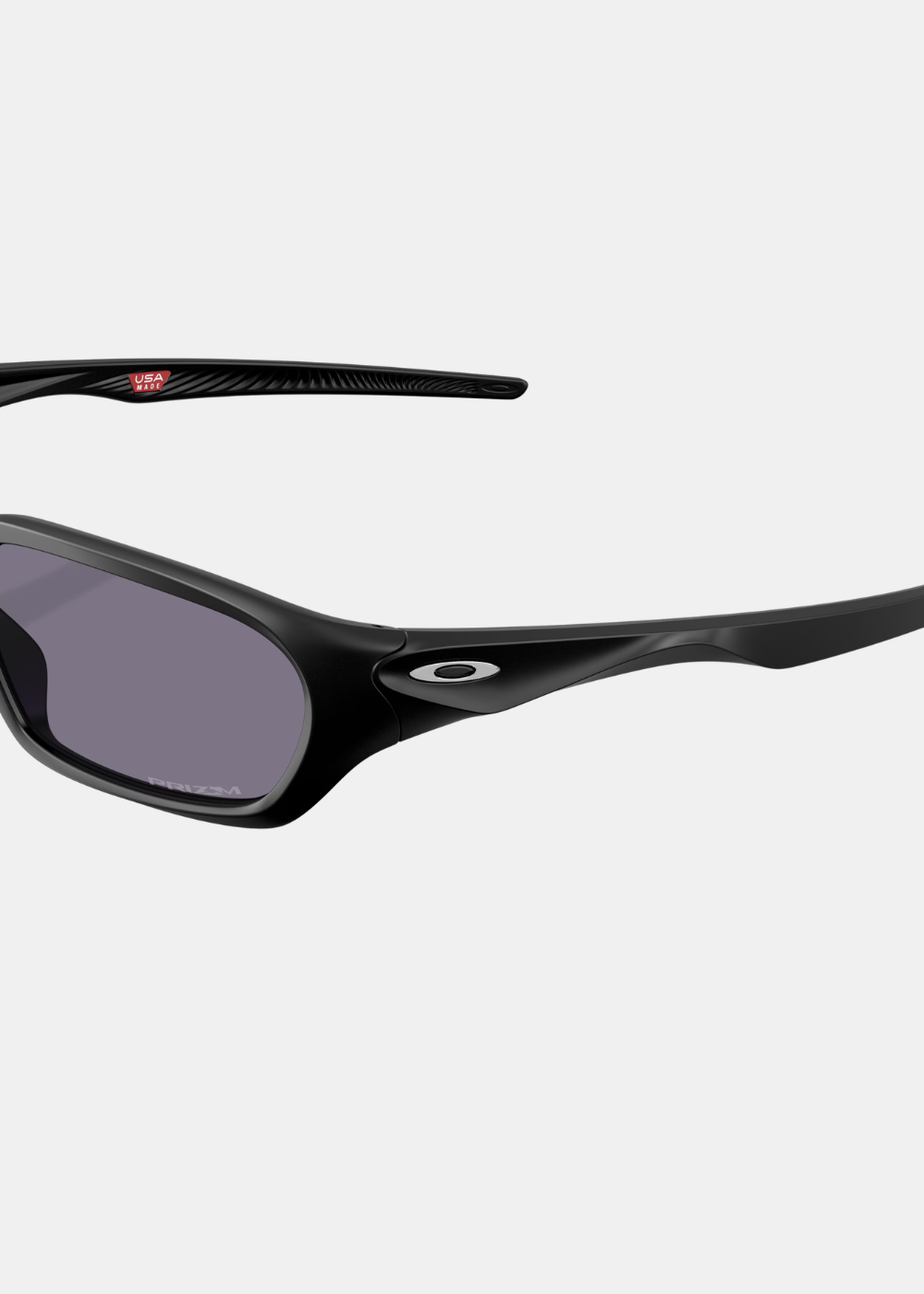 Grand motif sur le logo Oakley argenté et le gris prizm vert des lunettes Terraforma