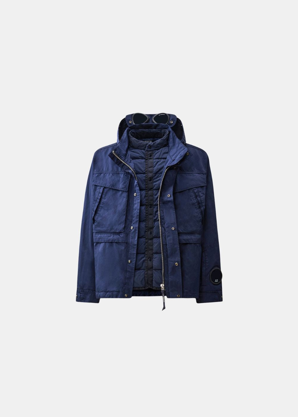 Veste Mille C.P. Company bleue en Micro Kei avec sa doublure en duvet amovible visible.